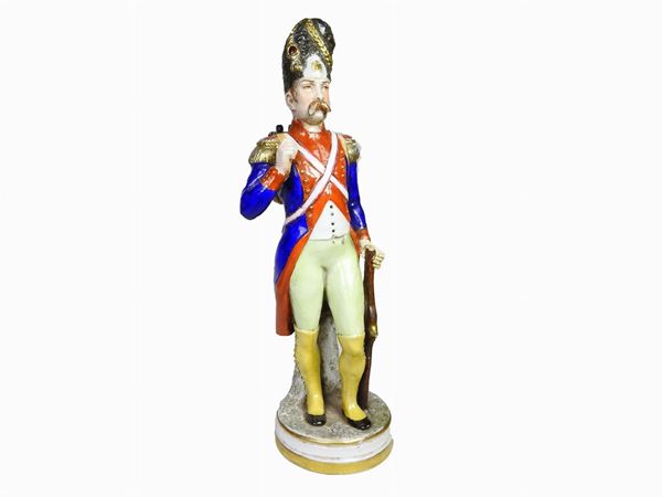A Painted Porcelain Figure of a Napoleonic Soldier