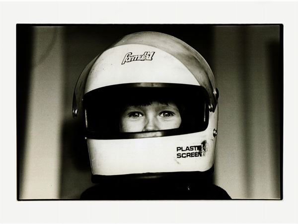 Marcello Arfini e Chiara Visconti - Bimbo con casco da Formula1 1981