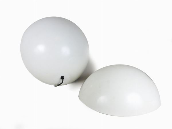 A Set of Four White Plastic Wall Lamps