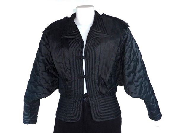 Leather chamois throusers and black silk jacket