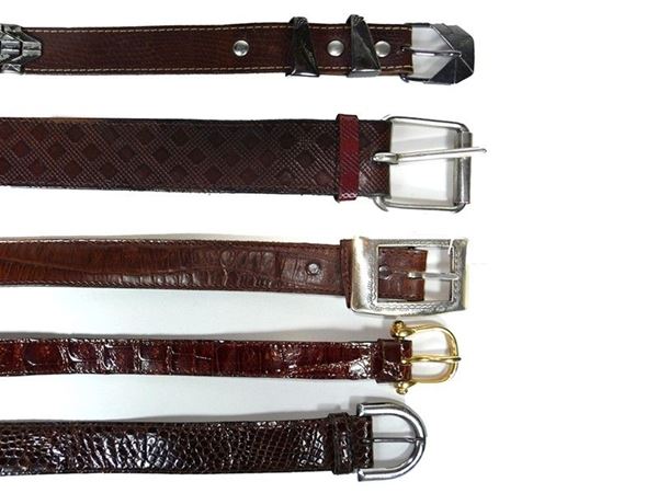 Five brown leather belts