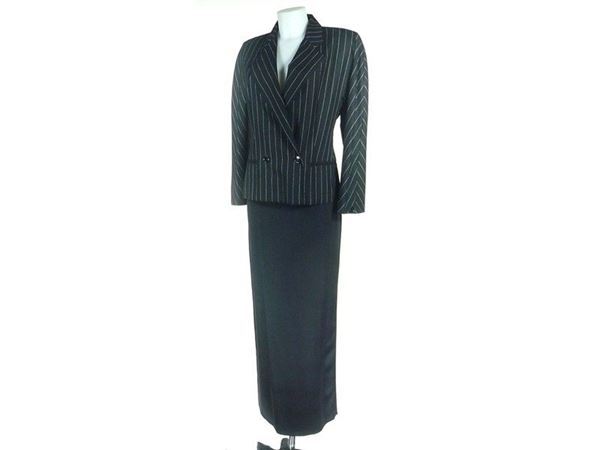 Pinstripe wool jacket and black silk skirt