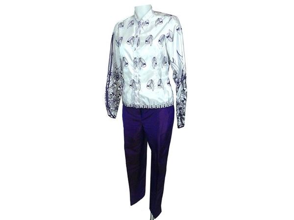 Lotto composto a una camicia, un pantalone, un body e due top
