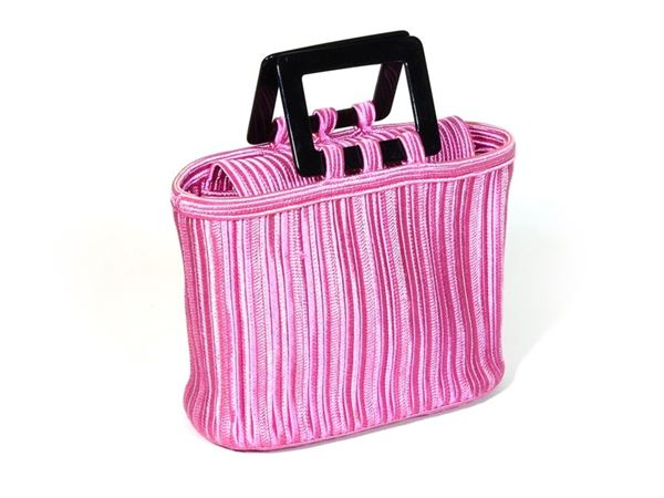 Pink woven fabric handbag