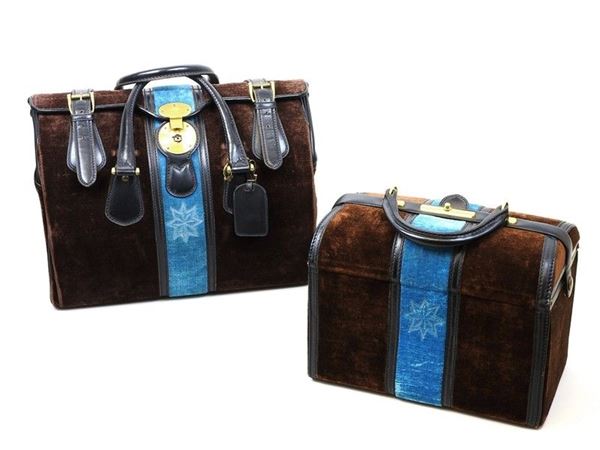 Brown and light blue carryall and beauty case