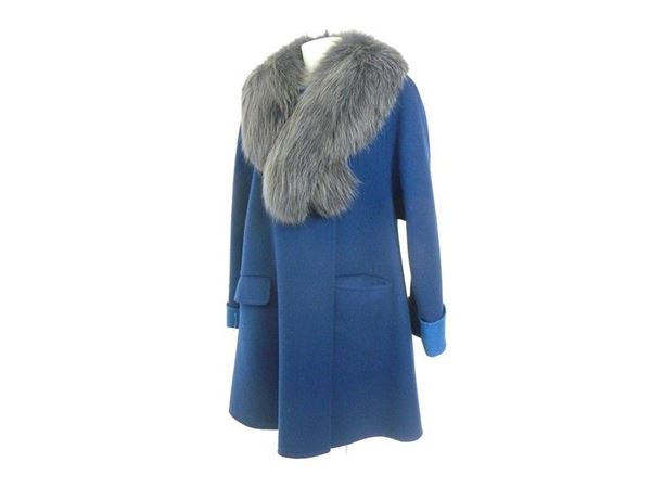 Blue wool coat with grey fox fur collar and padding