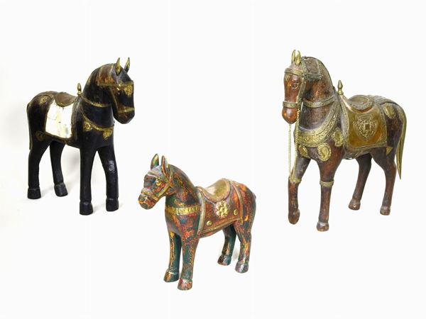 Three Wooden Horse Statues