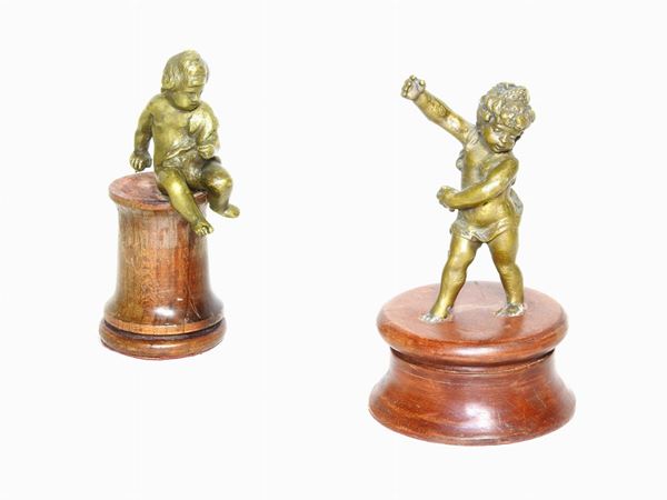 Two Bronze Figures of Putti
