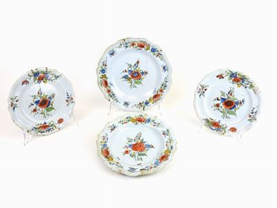 Quattro Piatti in Maiolica Policroma