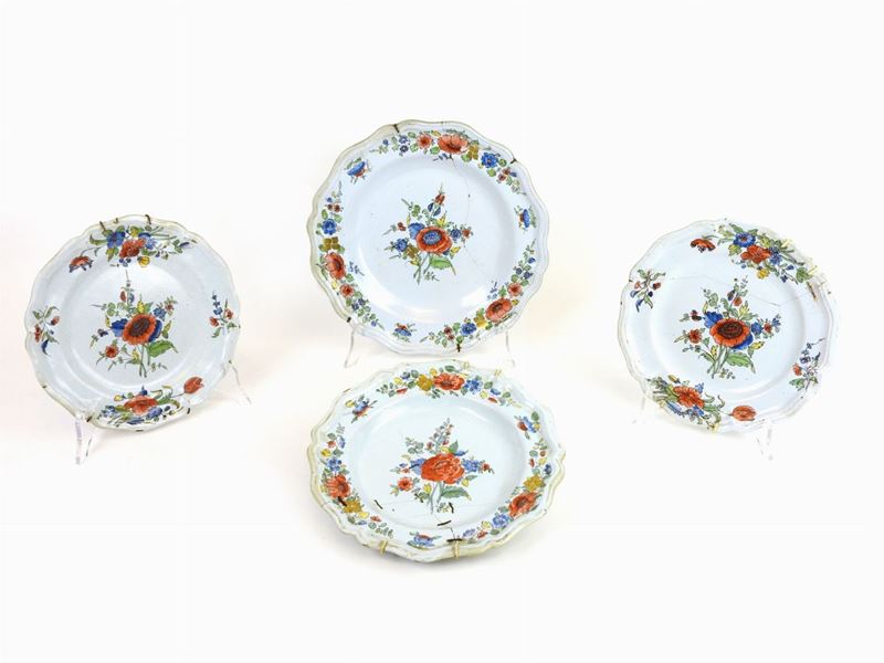 Quattro Piatti in Maiolica Policroma
