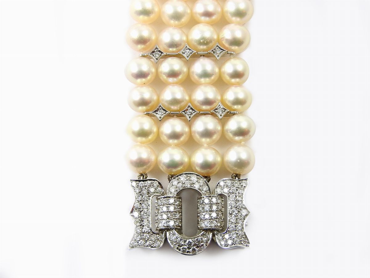 Bracciale a Quattro Fili in Perle