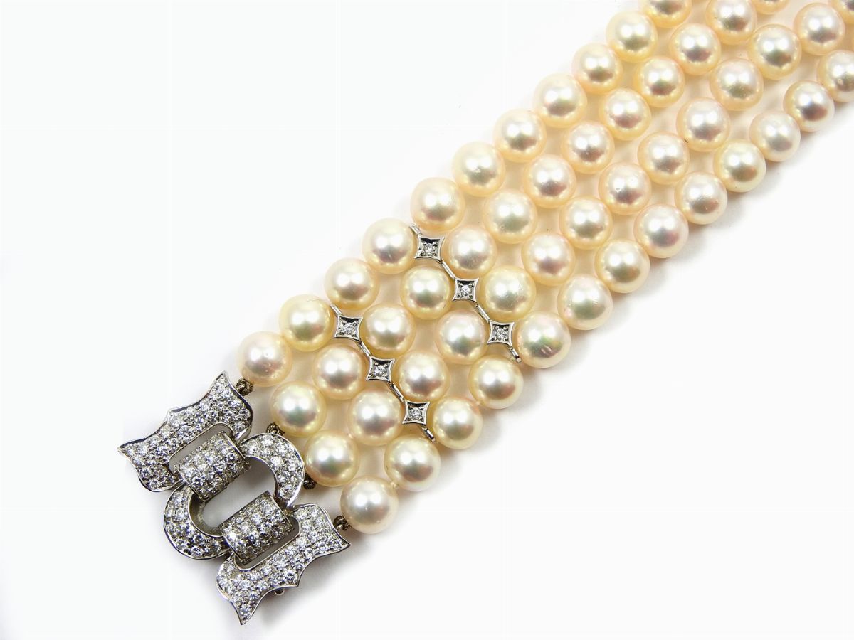 Bracciale a Quattro Fili in Perle