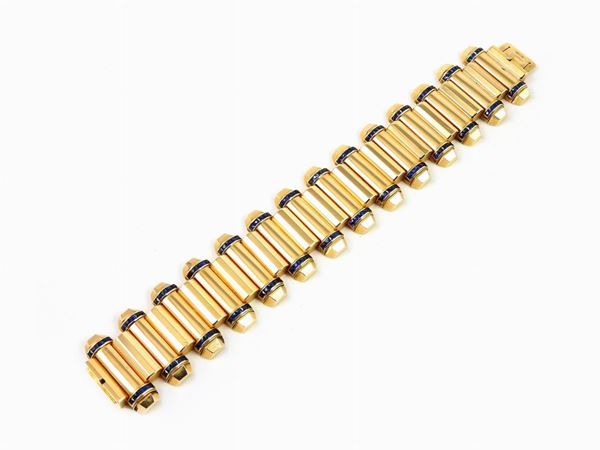 Yellow gold bracelet with sapphires
