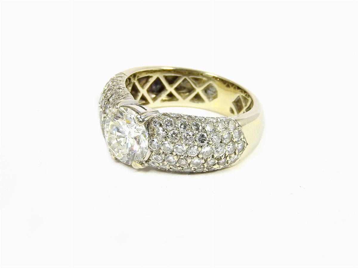 Anello Solitario in Oro Bianco e Diamanti