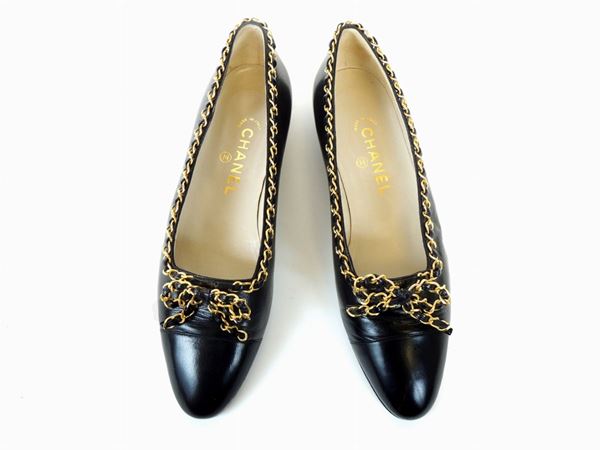 Pair of black leather ballet flat