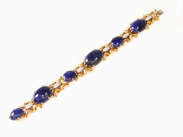 White and pink gold bracelet with diamonds and sapphires
