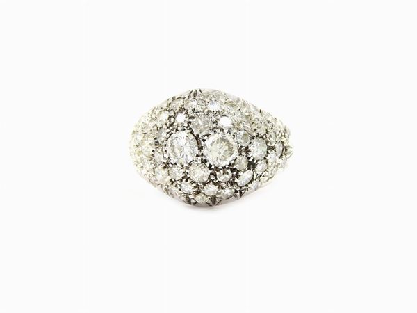 White gold ring studded with diamonds