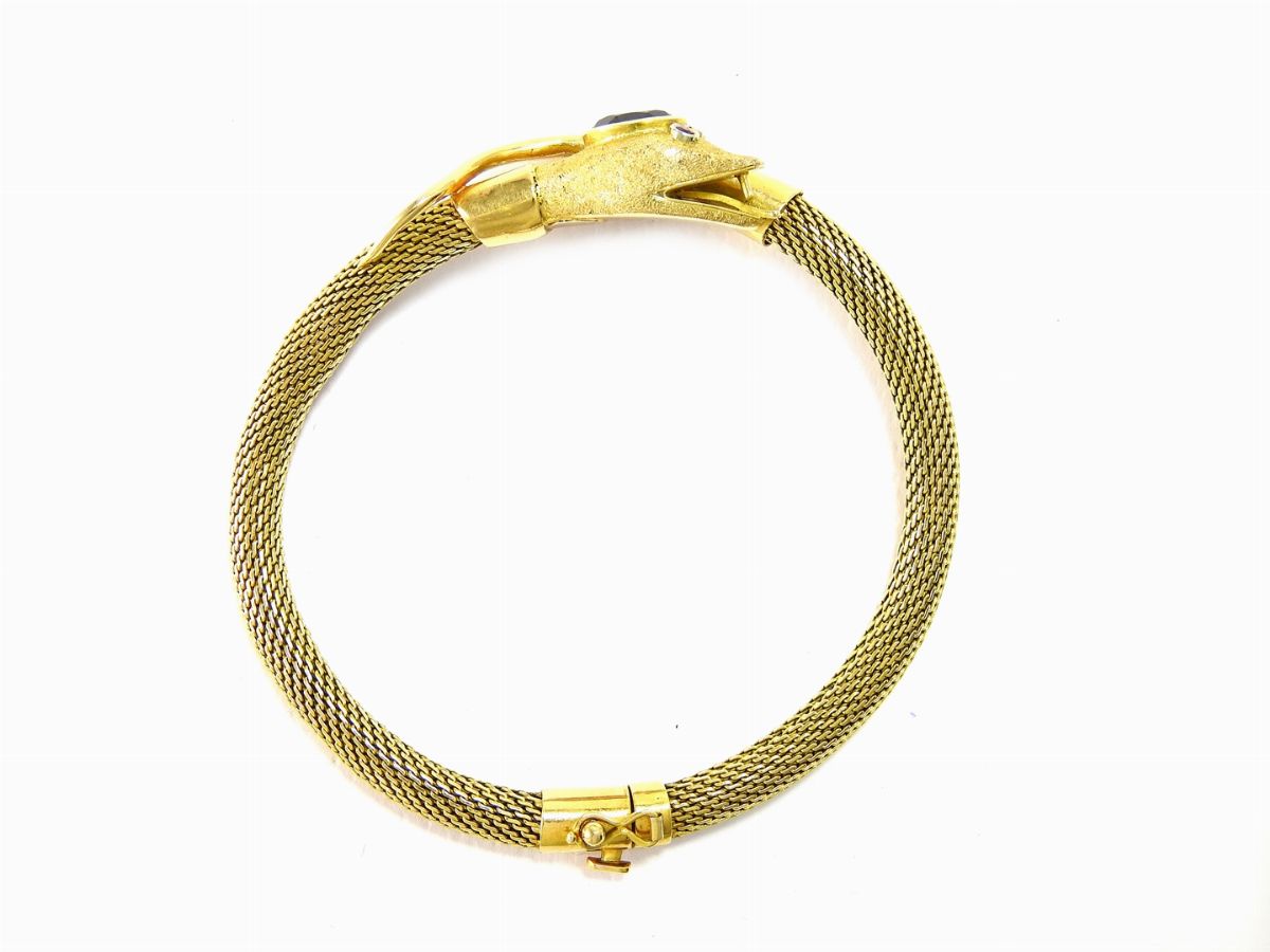 Bracciale Animalier a Maglia Morbida in Oro Giallo e Granato