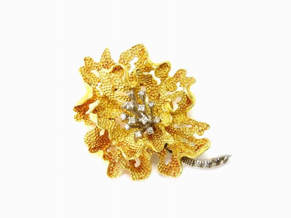 Yellow gold fancy brooch with diamonds