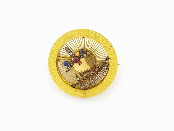 Refined yellow gold and silver Art Nouveau brooch with diamonds, sapphires and ruby