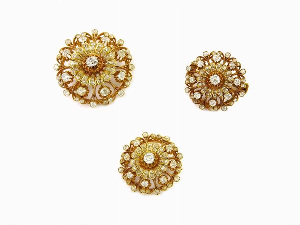 Three yellow gold and diamonds brooches-pendants