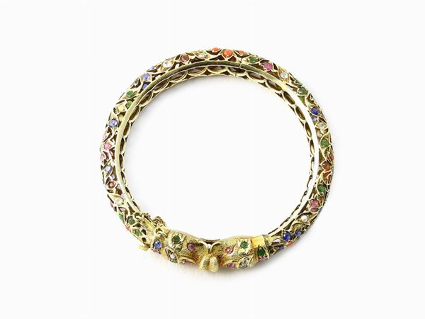 Low alloyed yellow gold bangle with coloured stones