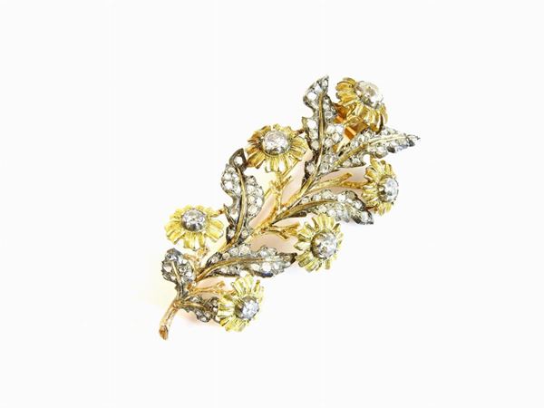 Yellow and white gold brooch