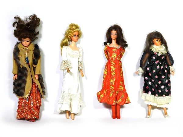 Lotto composto da quattro Barbie