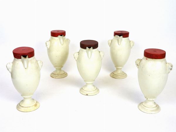 Serie di cinque vasi da farmacia in maiolica