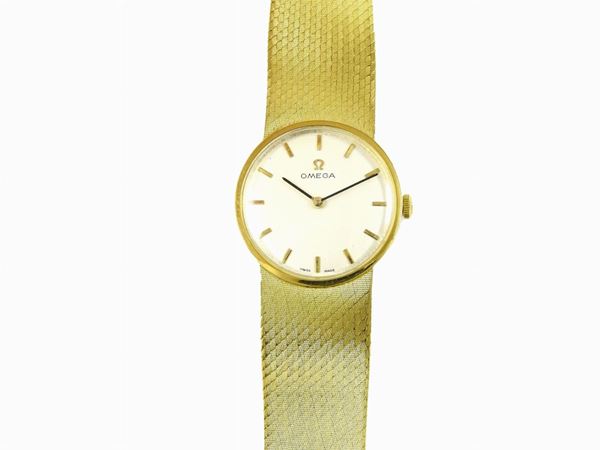 Manual ladys wristwatch yellow gold case and band