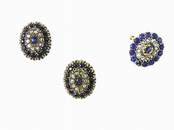 Parure of yellow gold and silver ring and earrings set with diamonds and sapphires