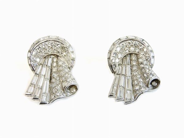 White gold earrings set with brilliant and baguette cut diamonds