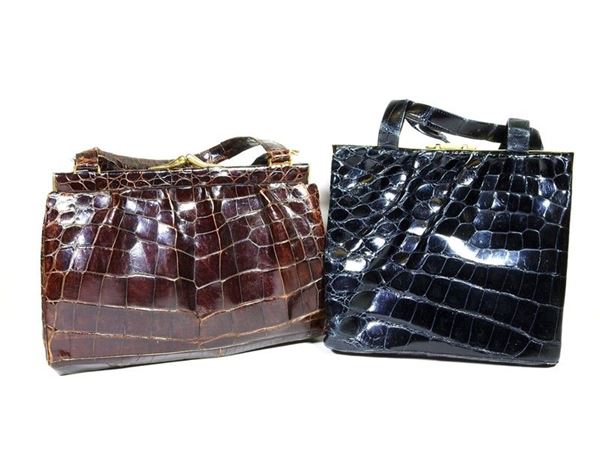 Two crocodile handbags