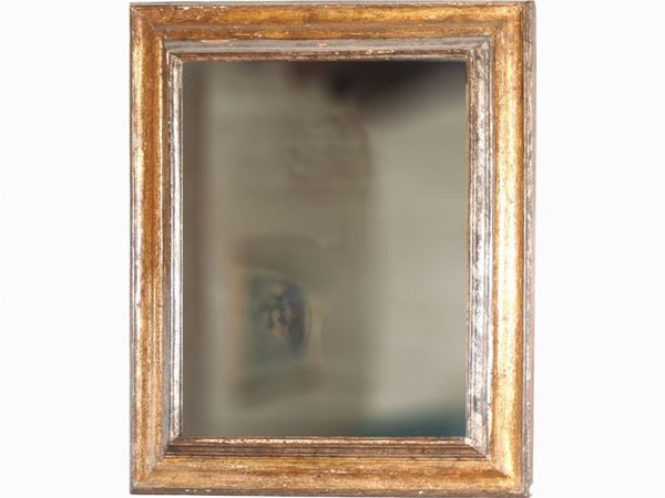 Specchiera in legno dorato e argentato  (XIX secolo)  - Asta Un antico casale: arredi e collezioni - I - II - Maison Bibelot - Casa d'Aste Firenze - Milano