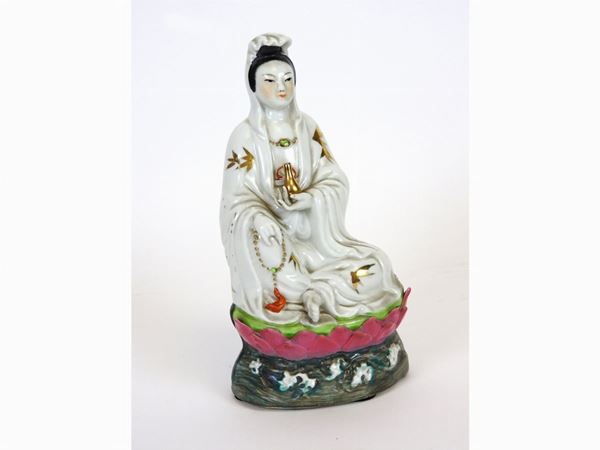 Painted Porcelain Figure of a Seated Quanin