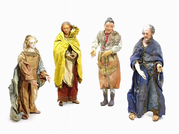 Quattro personaggi del presepe in gesso e terracotta policroma