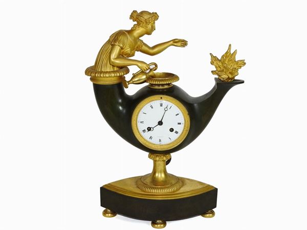 Gilded and Patinated Bronze Pendulum Mantel Clock