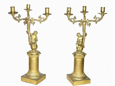 Coppia di Candelabri in Gelamina Dorata