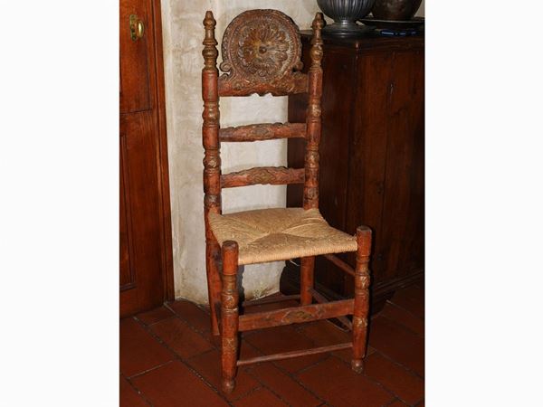 Antica sedia in legno laccato e in parte dorato
