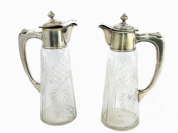 Pair of Glass and Silver Pitchers