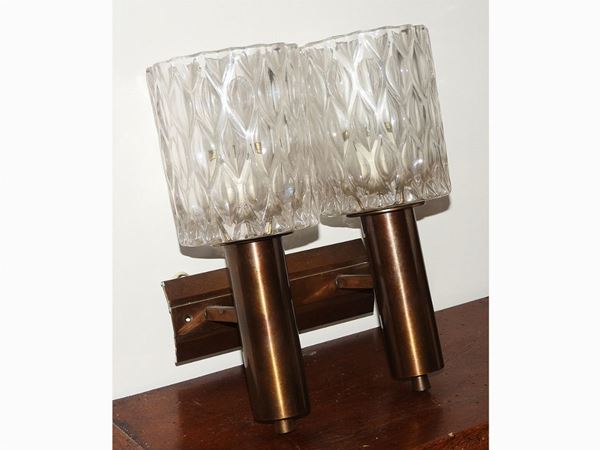 A Set of Three Brass and Glass Wall Lamps