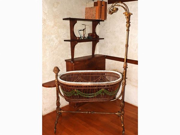 Gilded Wrought Iron, Wooden and Painted Wicker Cradle  (early 19th Century)  - Auction An antique casale: Furniture and Collections - II - III - Maison Bibelot - Casa d'Aste Firenze - Milano