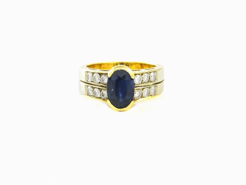 Anello in Oro Giallo con Diamanti e Zaffiro