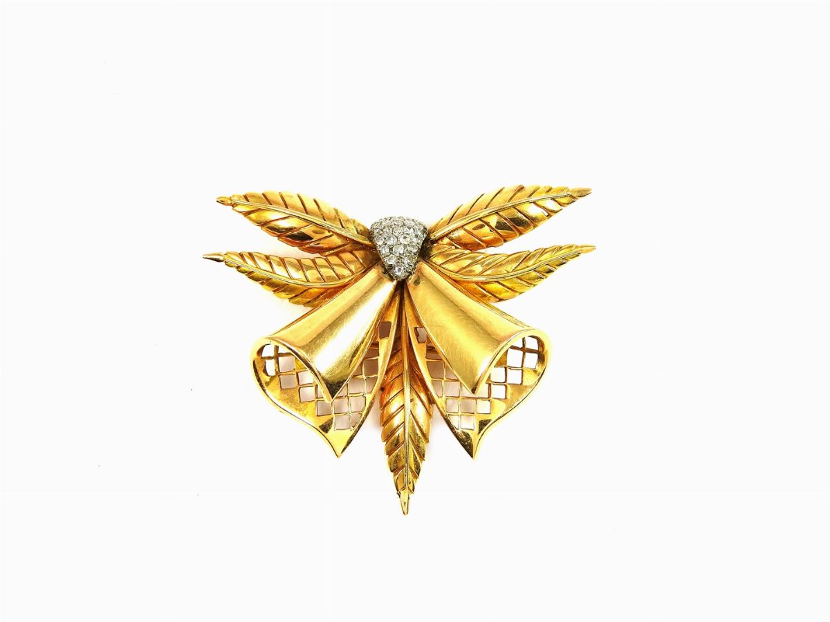 Quattro Spille in Oro Giallo e Bianco con Diamanti
