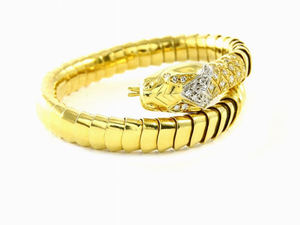 White and yellow gold animalier-shaped bangle with diamonds