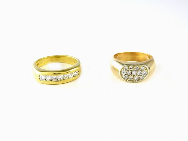 Two yellow gold rings with diamonds