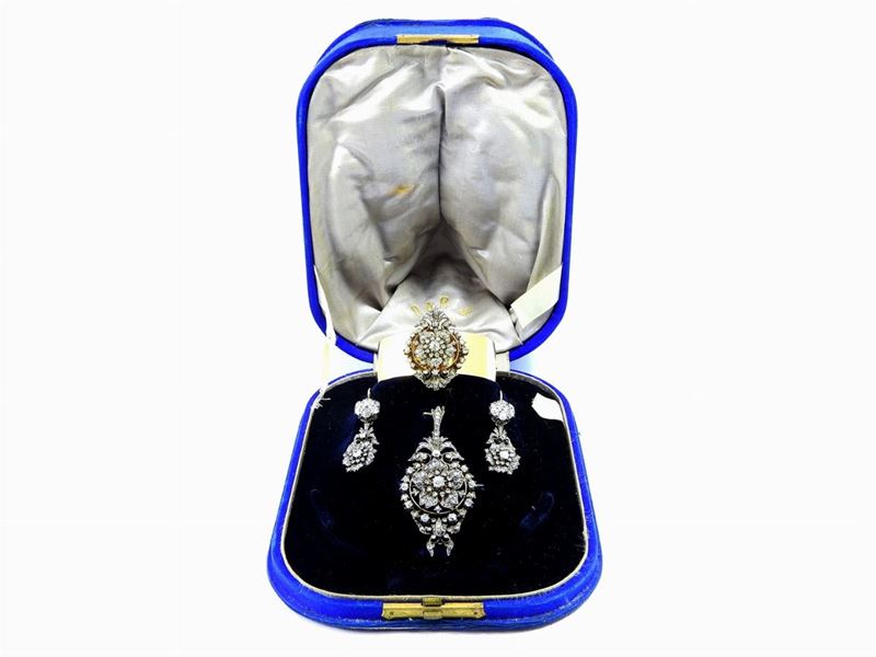 Parure Bracciale, Orecchini e Pendente in Oro Giallo, Argento e Diamanti