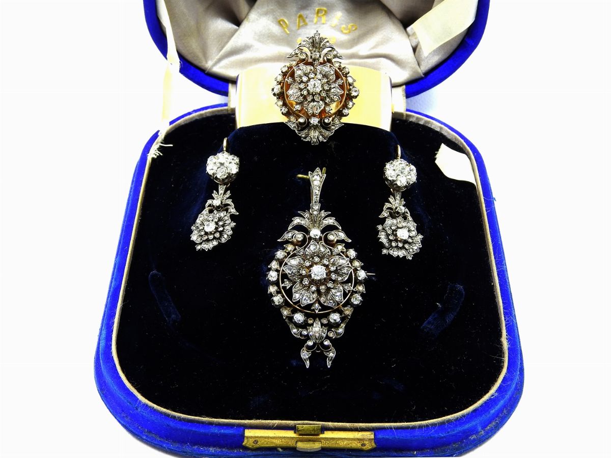 Parure Bracciale, Orecchini e Pendente in Oro Giallo, Argento e Diamanti
