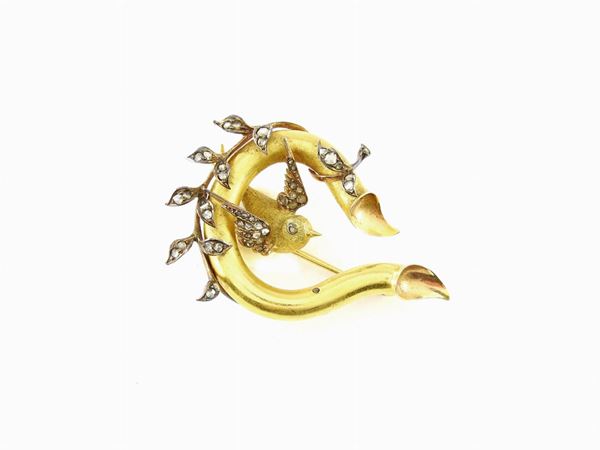 Yellow and pink gold, silver animalier-shaped brooch with diamonds
