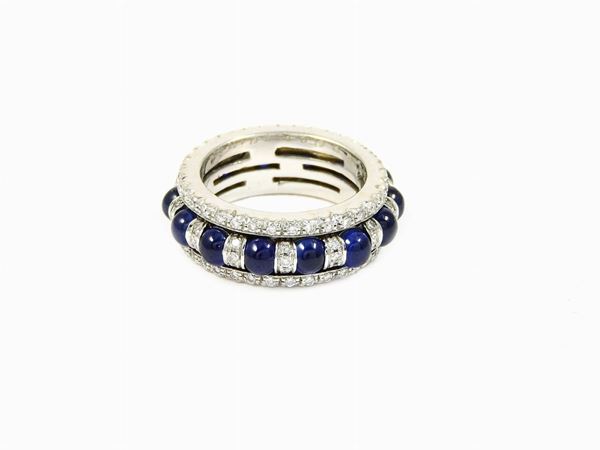 White gold eternity ring with diamonds and sapphires